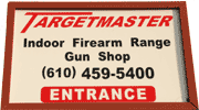 Sign over Targetmaster Indoor Firearm Range and Gun Shop entrance